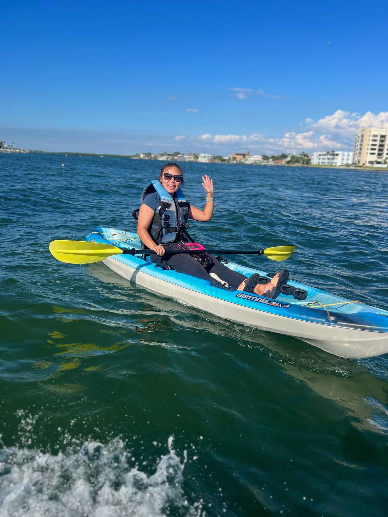 Women kayaking in the ocean